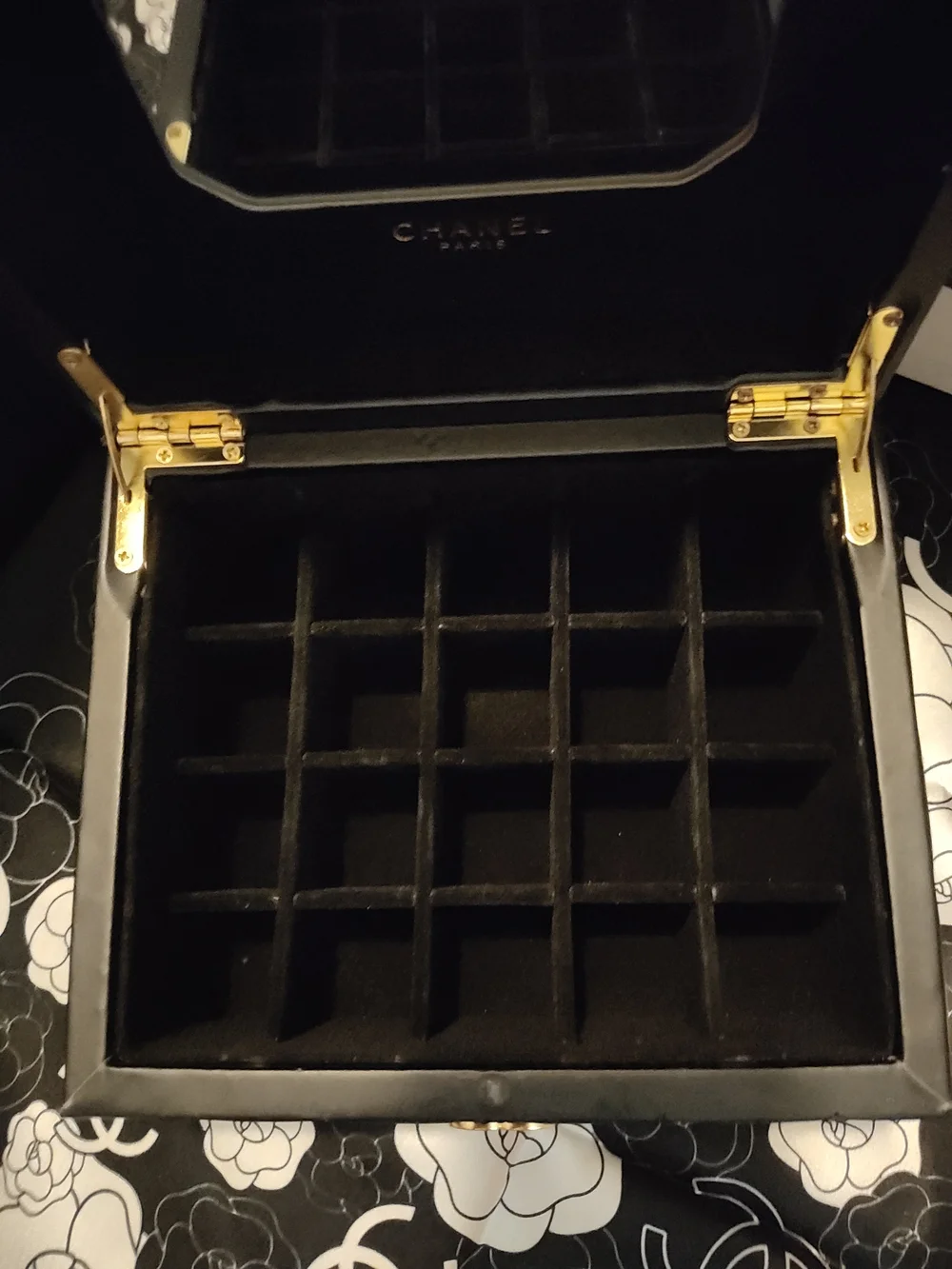 Black Quilted Jewelry Case with Gold Logo Accents And Mirror